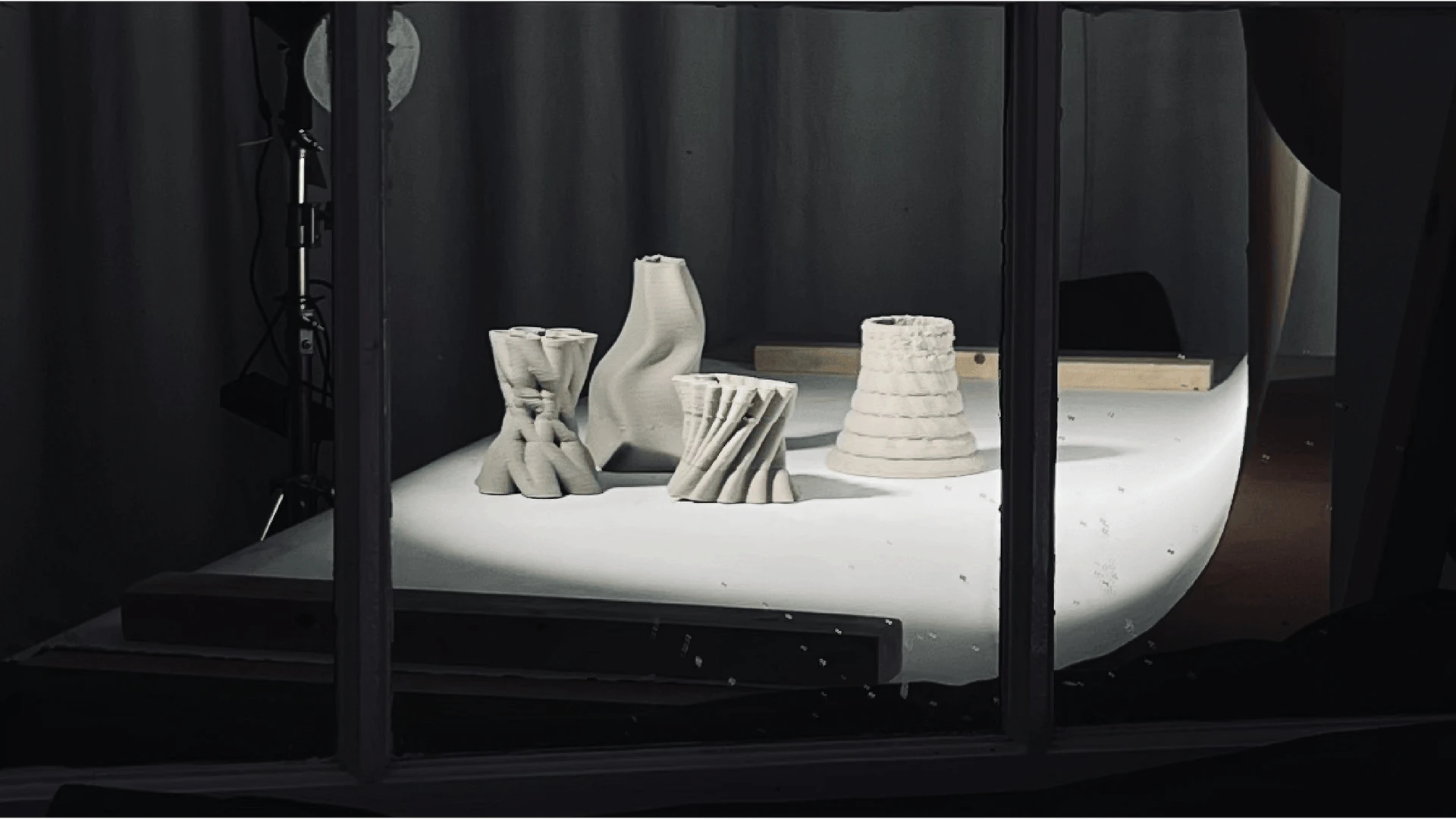 Physical models of semi-floating urban components displayed as an architectural study.
